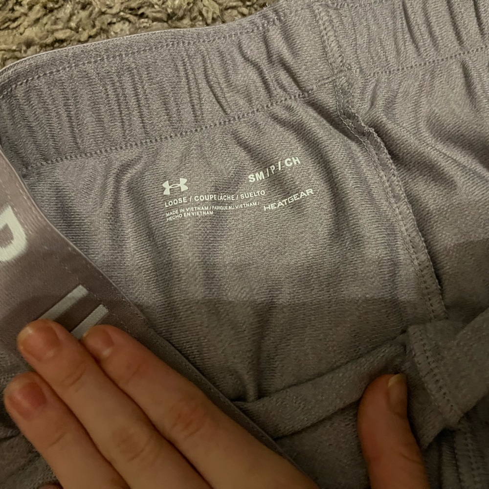 Under armor shorts with pockets and pretty purple color